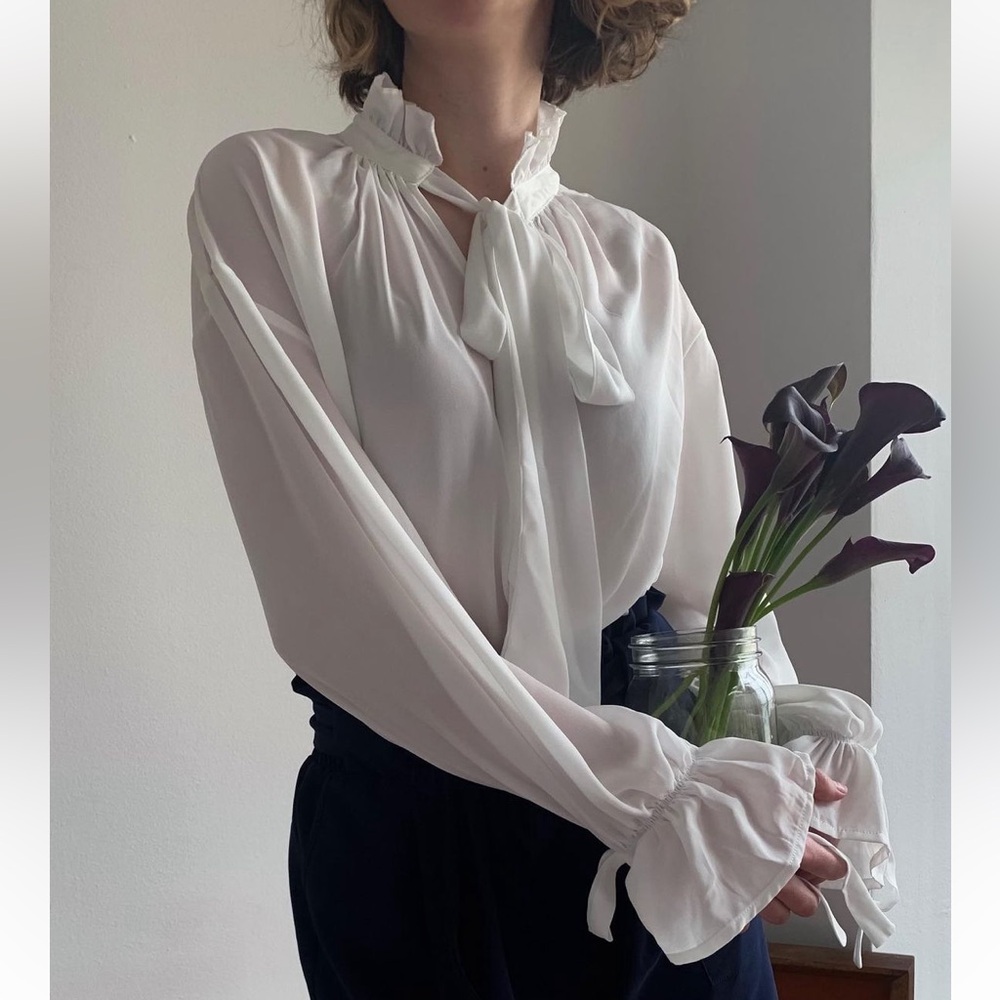 Neck Tie Blouse Gathered details cuffs with ties. 
White Sz Large anthropologie